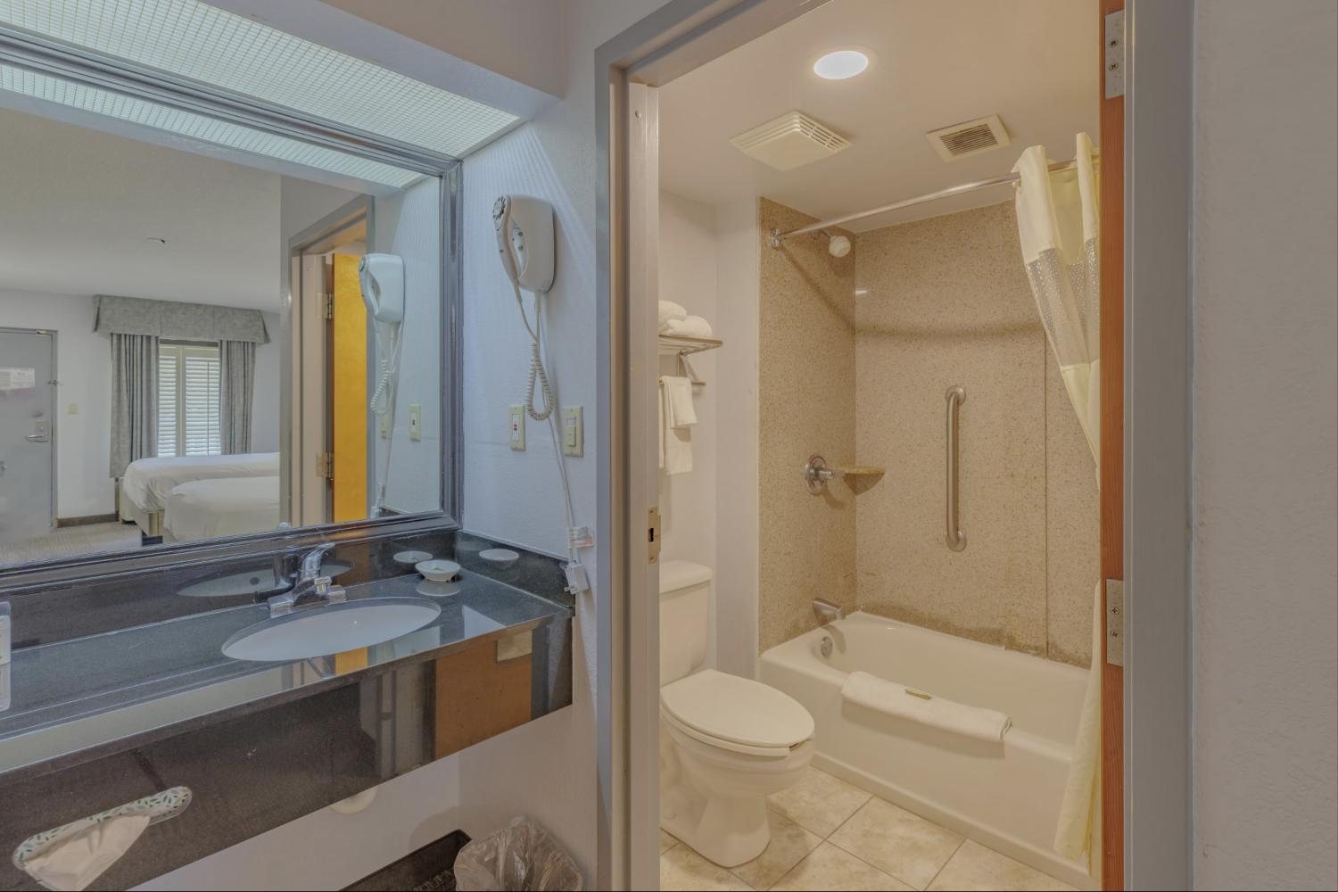 Vanity and bathroom